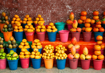 Mexican street market displays colorful fresh fruits in San Cristobal de las Casas, Chiapas, Mexico.