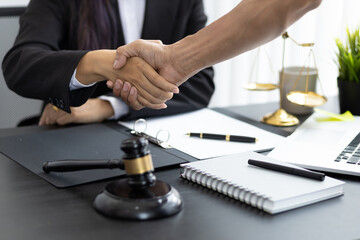 Handshake. Business people shake hands with lawyers contract legal cooperation agreement.