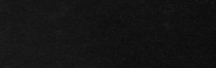 Textured black paper background texture. Dark velvet.