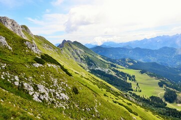 Hiking in the hills with beautiful views into the valley. Summer mountains. 