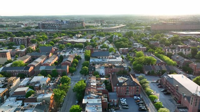 American city in USA. Aerial truck shot of neighborhood community during warm summer sunlight.