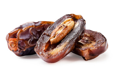 Dates fruit cut in half close-up on a white. Isolated