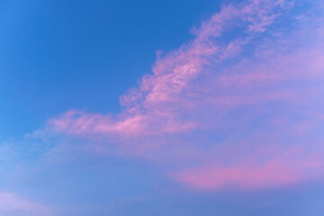 Pink clouds on a blue background