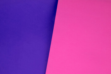 Dark vs light abstract Background with plain subtle smooth de saturated purple pink colours parted into two