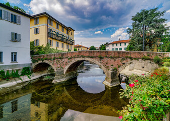 Ancient bridge over the Lambro river in the city of Monza Lombardy Italy