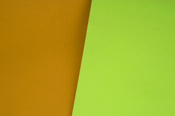 Dark vs light abstract Background with plain subtle smooth de saturated green yellow colours