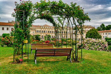 Monza,Italy,0529200 Rose garden of the royal villa of Monza which can be seen in the background