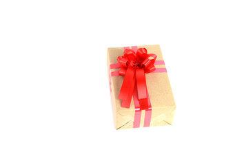 Brown craft gift box with red ribbon bow isolated on white background.	