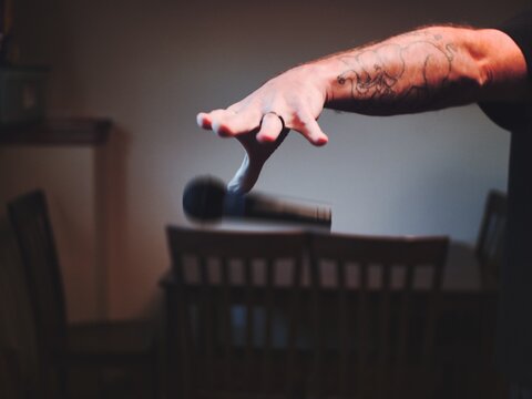Tattooed Male with Mic Drop