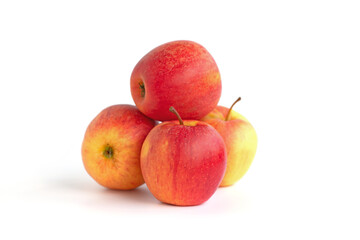 Group of four red apples (Malus domestica) isolated on white.