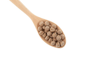 Pressed rye bran in wooden spoon on white background. Crunchy snack for breakfast. Healthy food...