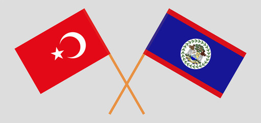 Crossed flags of Turkiye and Belize. Official colors. Correct proportion