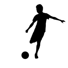 Silhouette of a boy kicking a ball, front view