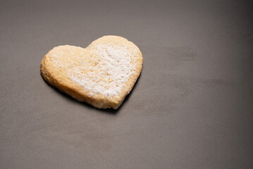Shortbread in the shape of a heart isolated on white background.