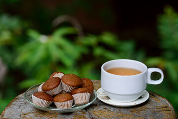 cup of coffee and banana cup cake the delicious breafast.