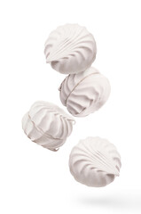 Flying zephyr marshmallows, isolated on white background