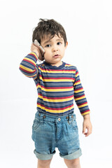 child talking on cell phone on white background