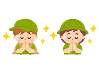 手を合わせて感謝する探検隊の子供　ボーイスカウト　冒険　アウトドア