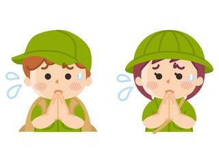 手を合わせて謝る探検隊の子供　ボーイスカウト　冒険　アウトドア