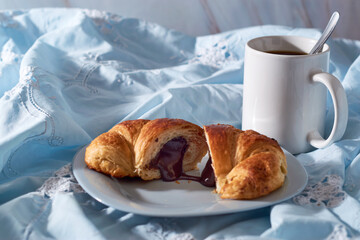 Plate of fresh croissants with chocolate stuffing