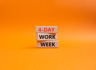 4-day work week symbol. Concept words 4-day work week on wooden blocks. Beautiful orange background. Business and 4-day work week concept. Copy space