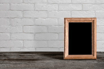 old photo frame on the wooden table