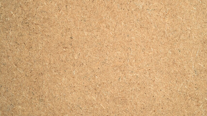 Empty blank Brown yellow cork board or note board. Close-up of corkboard texture