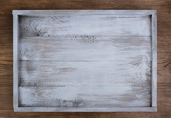 Top view of an empty rectangular wooden tray. Space for text, template for design, mockup.