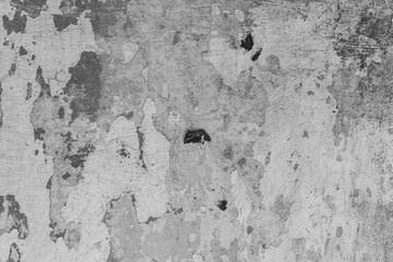 The concrete texture, wall, with cracks and scratches can be used as a background