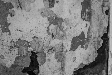 The concrete texture, wall, with cracks and scratches can be used as a background