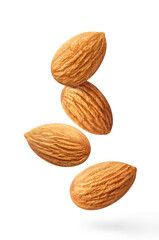 Flying delicious almonds, isolated on white background