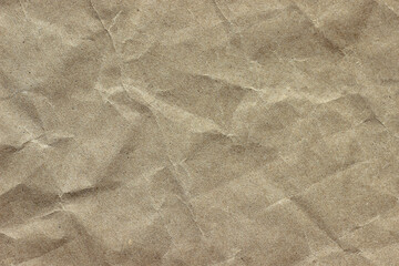Crumpled kraft beige paper background