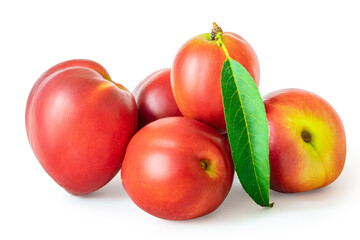 Group of nectarines with leaves isolated by clipping paths on a white background. The concept of a summer harvest and ripe delicious fruits in nutrition