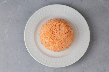 Traditional delicious Turkish food; rice pilaf with tomatoes (Turkish name; Domatesli pirinc pilavi)