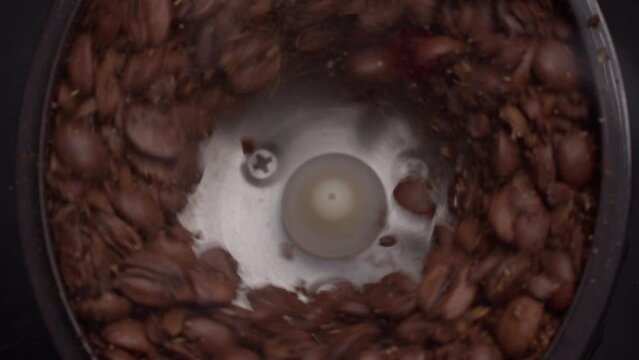 Coffee grinder grinds coffee beans 