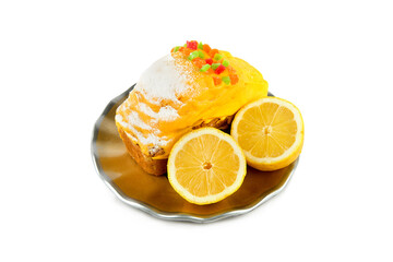 Lemon cupcake and lemon isolated on white .