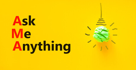 AMA ask me anything symbol. Concept words AMA ask me anything on yellow paper on a beautiful yellow background. Green light bulb icon. Business and AMA ask me anything concept. Copy space. - obrazy, fototapety, plakaty