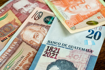 Guatemala money, various quetzal banknotes, business and financial concept