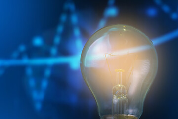 Classic electric light bulb on blurred background trend infographic. The concept of the energy...