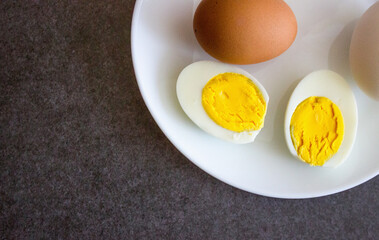 Boiled egg close-up. Vegetables and cooking
