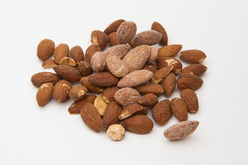 two types of flavored almonds isolated on white 