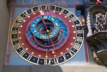 Close-up of clock face of clock tower named Zytglogge at the old town of Bern on a sunny summer...