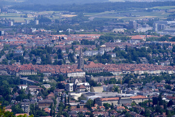 Aerial view over City of Bern and Canton Bern seen from local mountain Gurten on a blue cloudy summer day. Photo taken June 16th, 2022, Gurten, Switzerland.