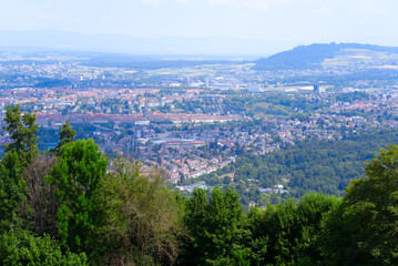 Aerial view over City of Bern and Canton Bern seen from local mountain Gurten on a blue cloudy summer day. Photo taken June 16th, 2022, Gurten, Switzerland.