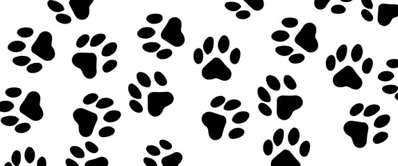 Pet prints. Paw pattern. Footprints for pets, dog or cat. Black dog paw path isolated on white background. The kitten walked through the white snow.