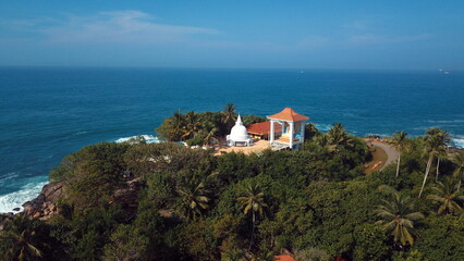 Fototapeta na wymiar Beach coastline in Unawatuna, Sri Lanka. Popular destination for tourists visiting Sri Lanka. Situated close to Galle and Mirissa