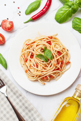 Italian bolognese pasta on a gray marble table. View from above
