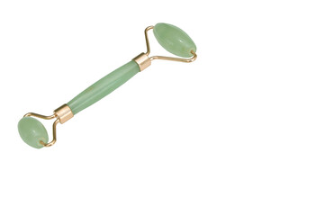 Jade facial roller green, isolated on a white background. Free space for text. Facial massager, skin care, female beauty items.