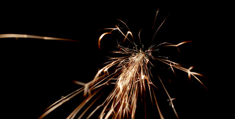 sparks in the dark. lines of light.