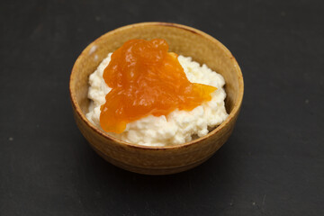 simple still life with cottage cheese in a ceramic bowl